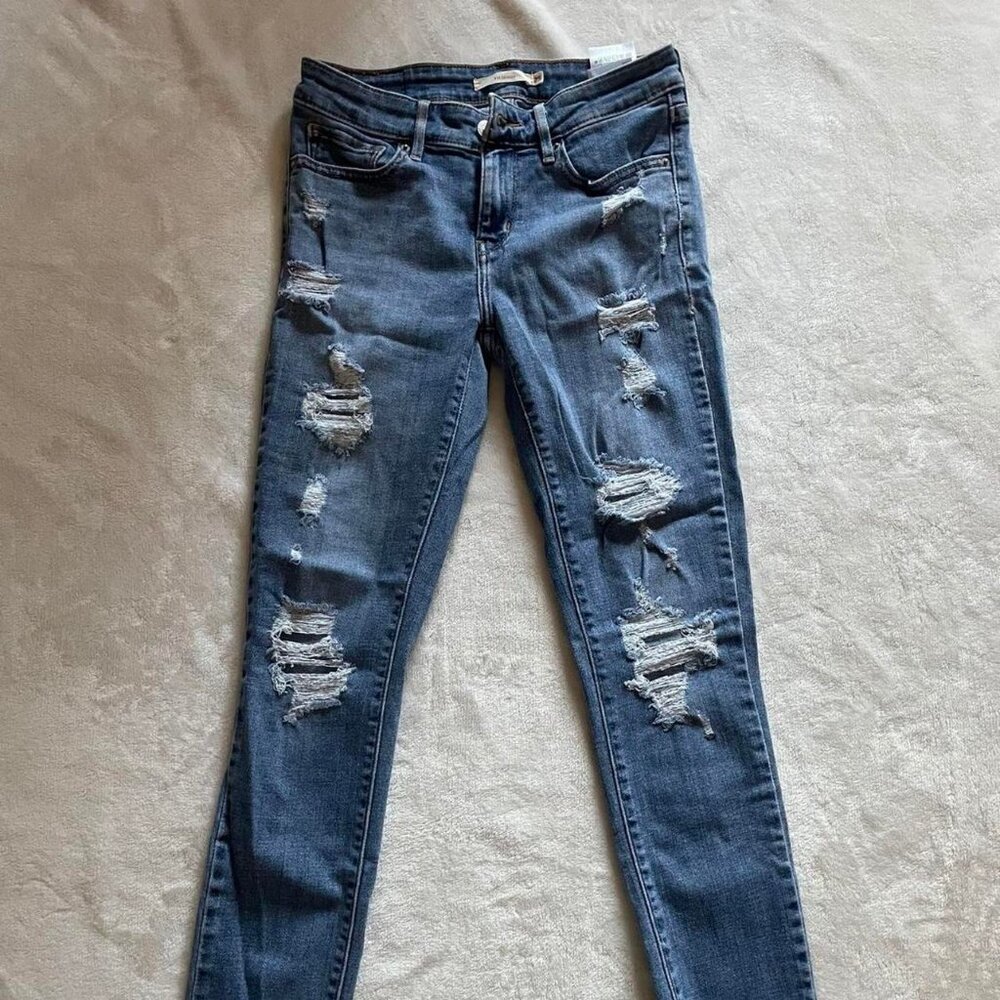 Levis Distressed Skinny Jeans W25